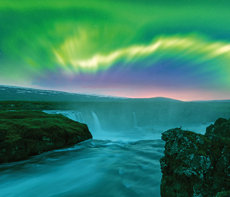 The Northern Lights over the Godafoss Waterfall, Iceland
