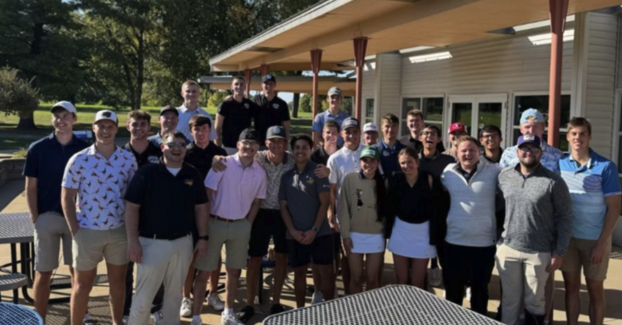 Group of UNI real estate students smiling .