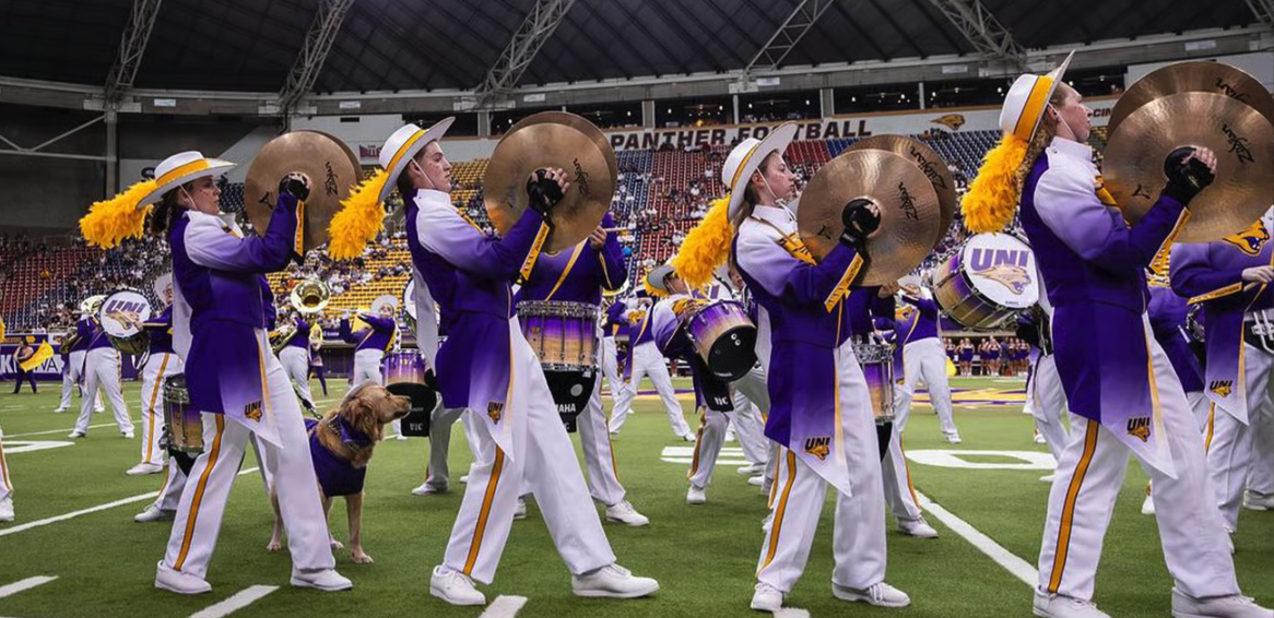 Panther marching band performing on the field.