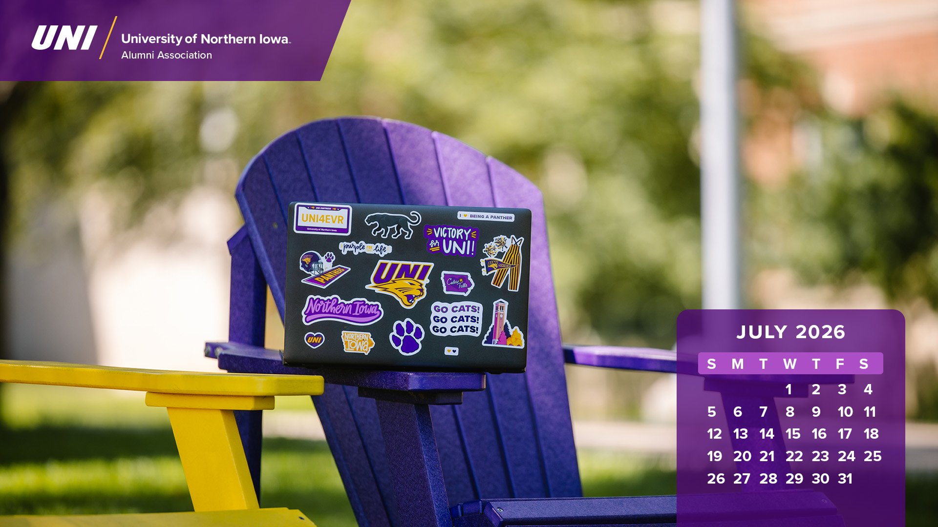 Purple chair with UNI sticker-filled laptop with calendar graphics