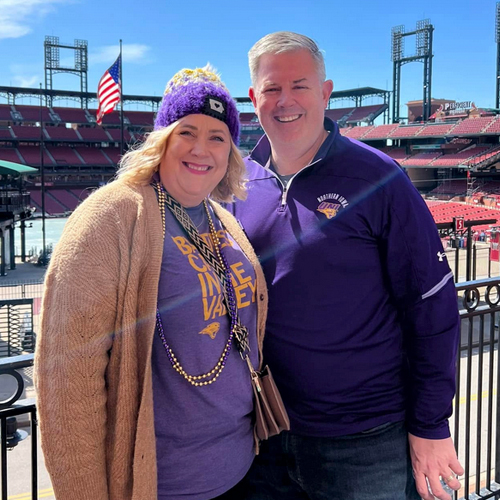 Two Panther fans pose at the 2024 Arch Mandess pregame fan rally