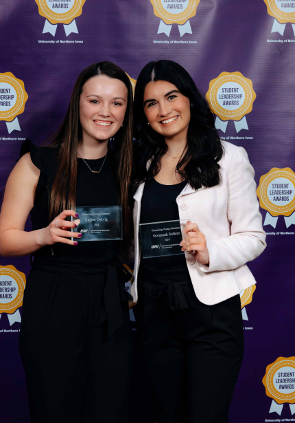 Kaylee Oskvig & Savannah Soltero holding their awards.