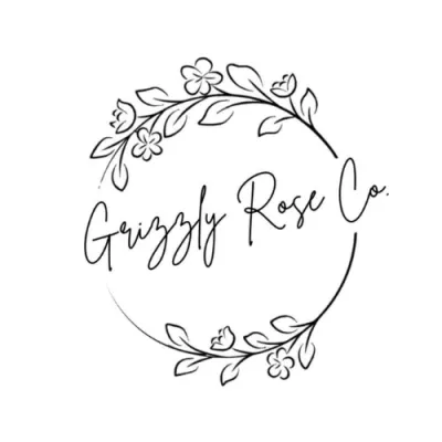 Grizzly Rose Co. logo with floral wreath and cursive text