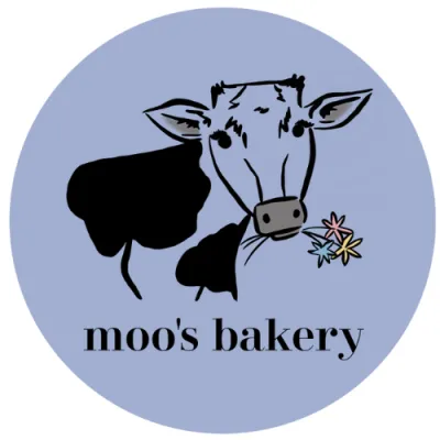 Logo featuring image of a cow holding flowers with the words "moo's bakery"