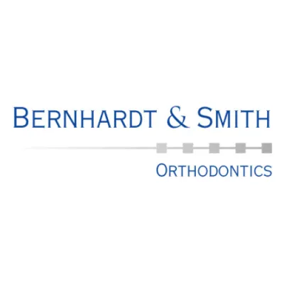 Bernhardt and Smith Orthodontics logo with braces design