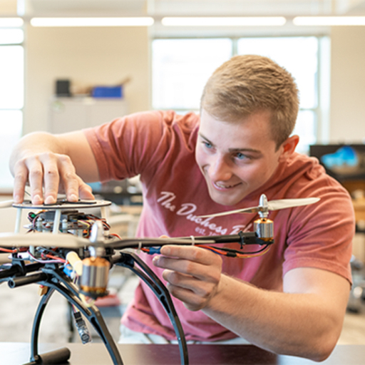 UNI physics student experimenting with drone