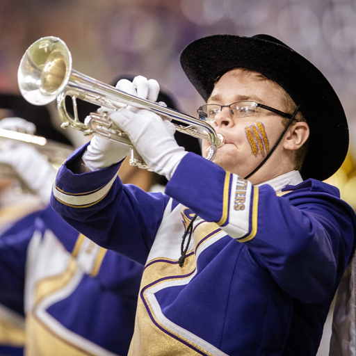 The Panther Marching Band performs at a UNI Football game.