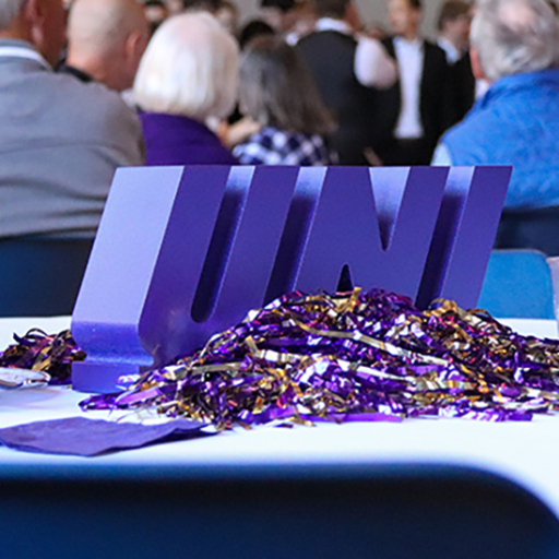 UNI table sign at the 2023 Golden Graduate Reunion